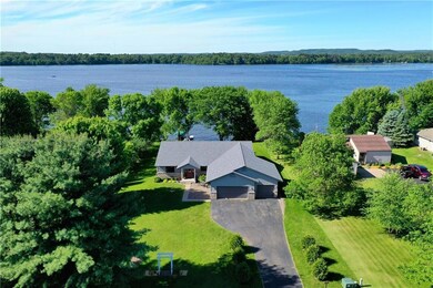 Enjoy 100 feet of shoreline on the South side of U