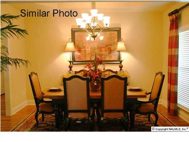 Formal Dining with trey ceiling, Crown molding is Standard & 5'' hardwood floors