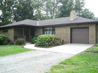 Exterior Front. Extra-long garage