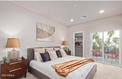 Primary bedroom with private patio