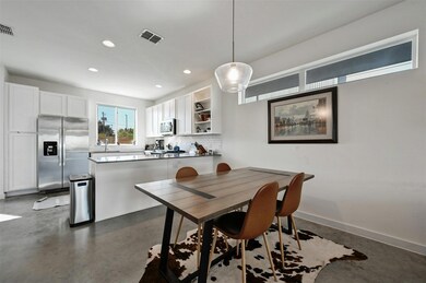 Dining room with baseboards, visible vents, reces