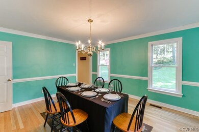 Formal dining room with oodles of windows!