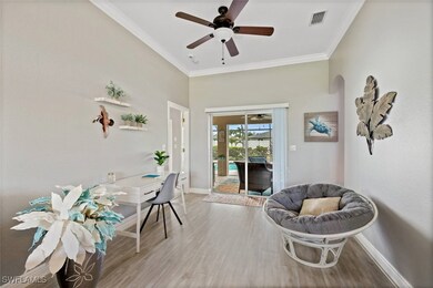 Office space featuring ceiling fan, light wood-typ