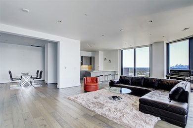 View from living back toward dining and kitchen