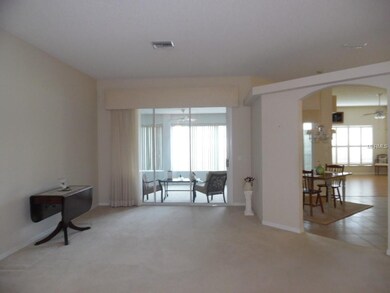 Formal Living area with sliders to Florida Room