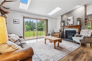 Living Room with sliding door access to back deck