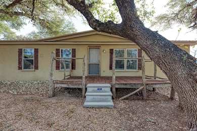 View of front of property featuring stucco siding