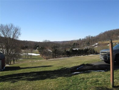 Amazing view, lot goes down tho the driveway behin