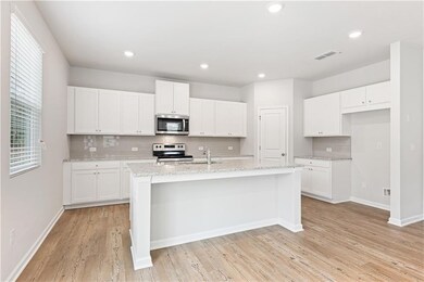 Kitchen featuring stainless steel appliances, a ce