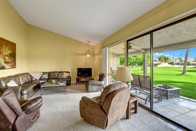 LIVING ROOM TO BACK PATIO AND VIEW (Medi