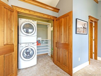 Laundry in foyer closet