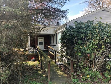 Walkway from the side driveway leading to the main