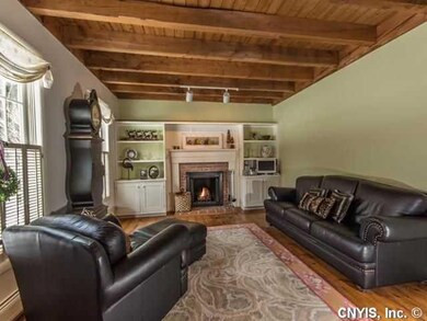 Living Room 9  beamed ceilings & wide plank pine f