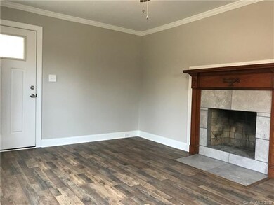 Large living room with plenty of natural light.
