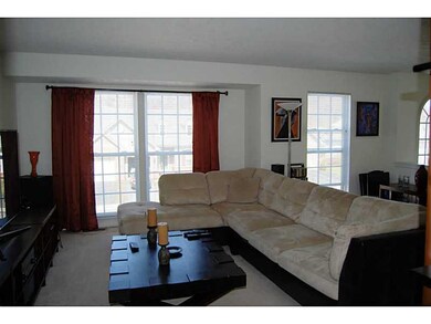Living Room. Spacious Living Room is Bright and Op