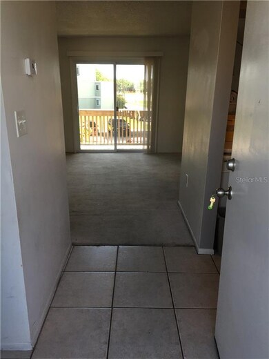 Enter your new condo with tiled flooring in wet ar