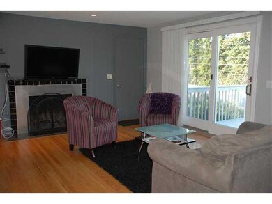 Family Room Large fireplaced family room with slid