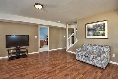 With a formal living room downstairs & a separate 