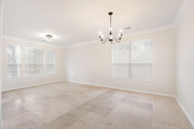 Empty room featuring a chandelier, ornamental mol
