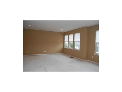 Large living room, freshly painted, and lots of wi