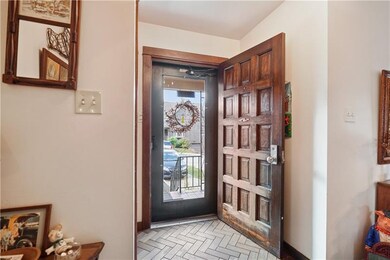 Front entryway with a coat closet