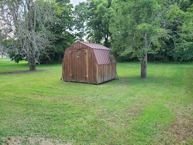 Shed remains with property