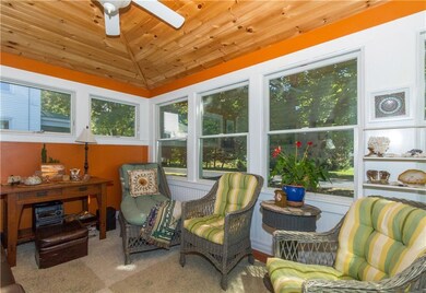 The enclosed three season porch area