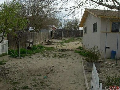 Side yard entry fro additional parking or access t