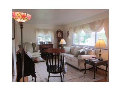 Living Room. A CLASS ACT - Spacious living room wi
