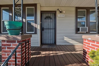 Entrance to property with cooling unit and a porch