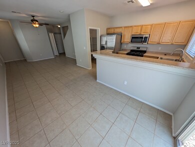 Kitchen with stainless steel appliances, a ceiling