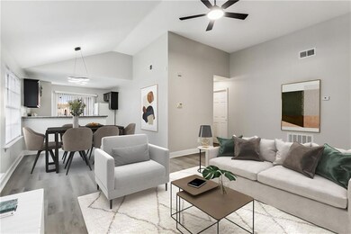 Den open to kitchen virtullay staged