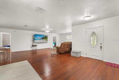 Front Entrance & Living Room