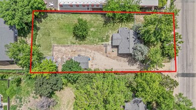 Aerial overview of property's location featuring property boundaries highlighted