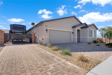 Mediterranean / spanish-style home with a garage,
