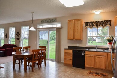 Open eat-in kitchen with a pantry.