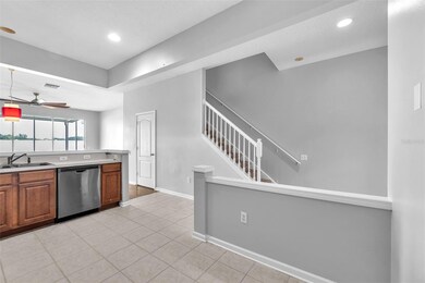 The kitchen has sight-lines to the backyard and water view beyond.