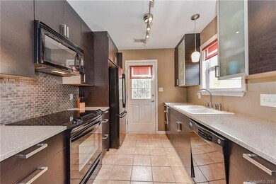 updated kitchen, refrigerator remains