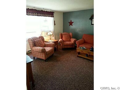 Living Room Big window allows natural light in