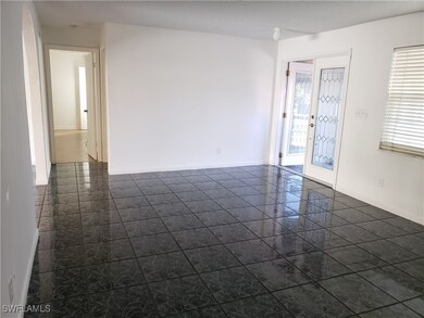 Empty room with baseboards