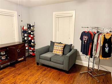 Living Room through left door. Leads to bedroom.