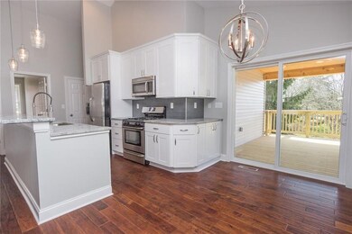 Room at the breakfast bar for 5/6 or use the dinin