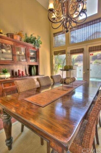 Custom Lighting & window coverings in formal dinin