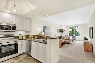 Freshly updated with BRAND new refrigerator, stove, microwave, paint, carpet, lighting...wonderful