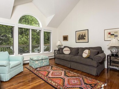 Sunken living room with vaulted...
