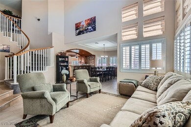 Living area featuring stairway, tile wood finished
