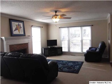 Greatroom with wood-burning fireplace complete wit