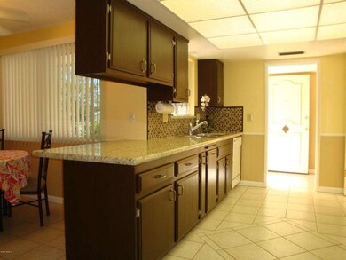 2a KITCHEN WITH GRANITE COUNTER TOPS