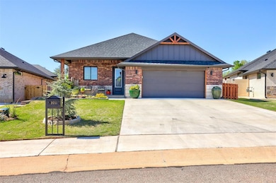 Craftsman-style home featuring a garage and a fron