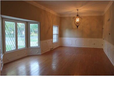 Lovely Formal Living/Dining with wood floors, gorg